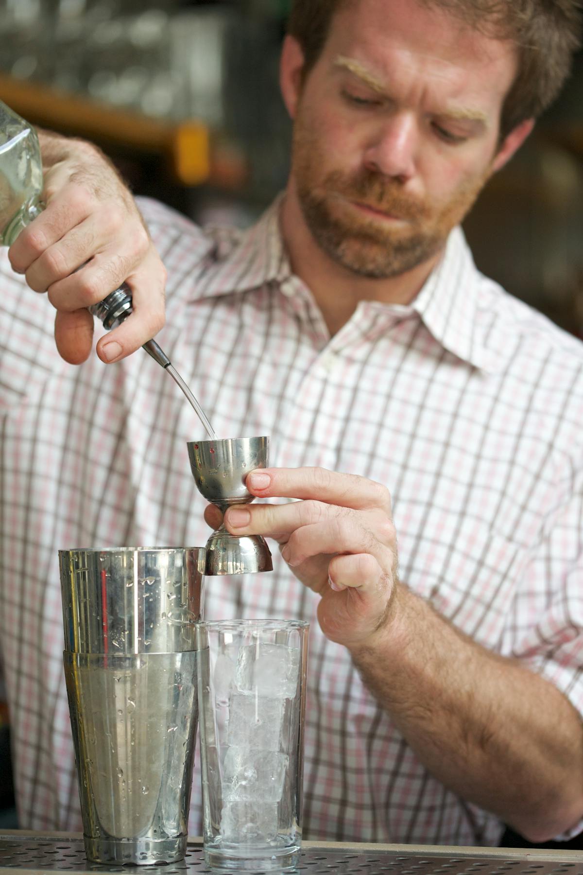 a man holding a glass of wine